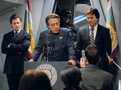 Adama, flanked by Apollo and Tom Zarek in Battlestar Galactica