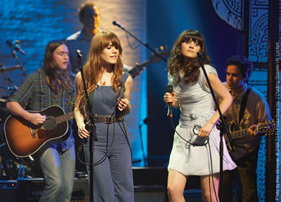 Rilo Kiley's Jenny Lewis and Zooey Deschanel and M Ward of She & Him perform What's So Funny About Peace, Love And Understanding Rilo Kiley's Jenny Lewis and Zooey Deschanel and M Ward of She & Him perform What's So Funny About Peace, Love And Understanding