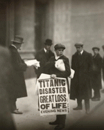 titanic-paper Newsboy sells a paper reading "Titanic disaster great loss of life"