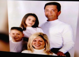 Theresa Caputo, Larry Caputo, Victory Caputo and Larry Jr. Caputo family photo.
