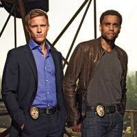 Warren Kole as Wes, Michael Ealy as Travis
